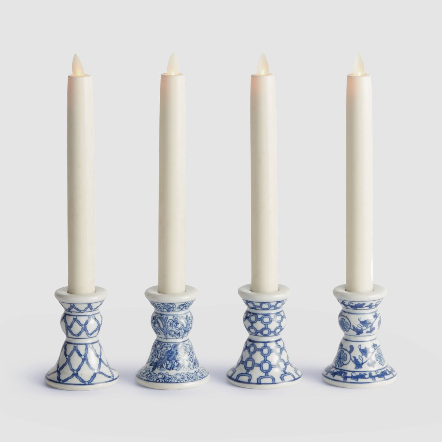 Blue and white chinoiserie mini taper holders (set of 4) - stylish home accent (Image1).