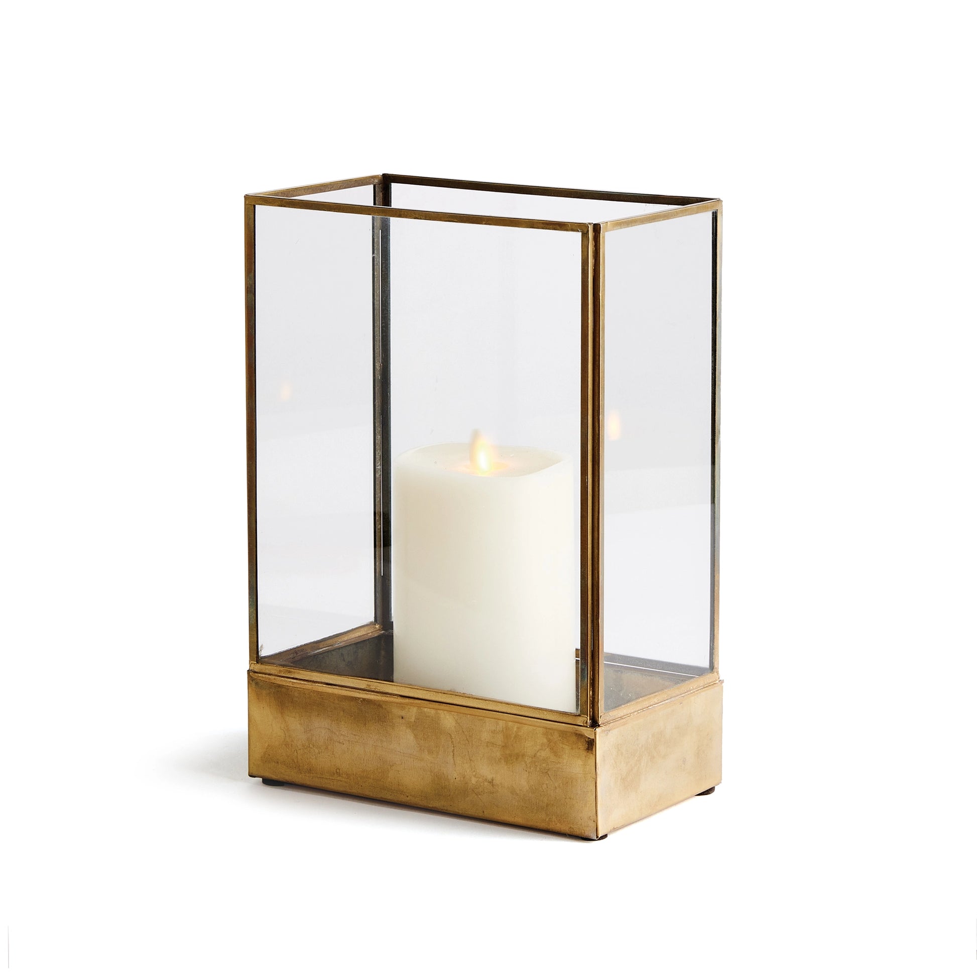 Small brass hurricane candle holder with light gray background.
