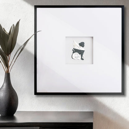 Contemporary framed black and white griffin artwork on textured wall with vase and greenery.