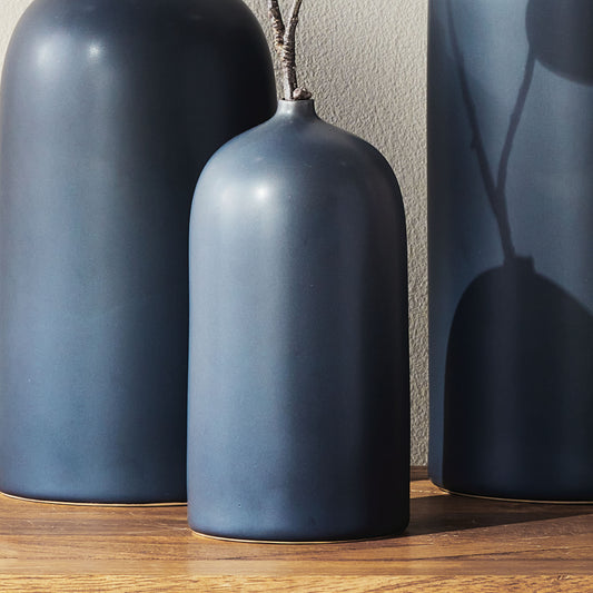Dark blue ceramic small vase - stylish home accent (Image1).