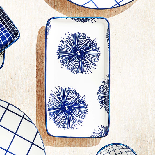 Dark blue starburst 8 inch ceramic trays (set of 4) - stylish home accent (Image1).