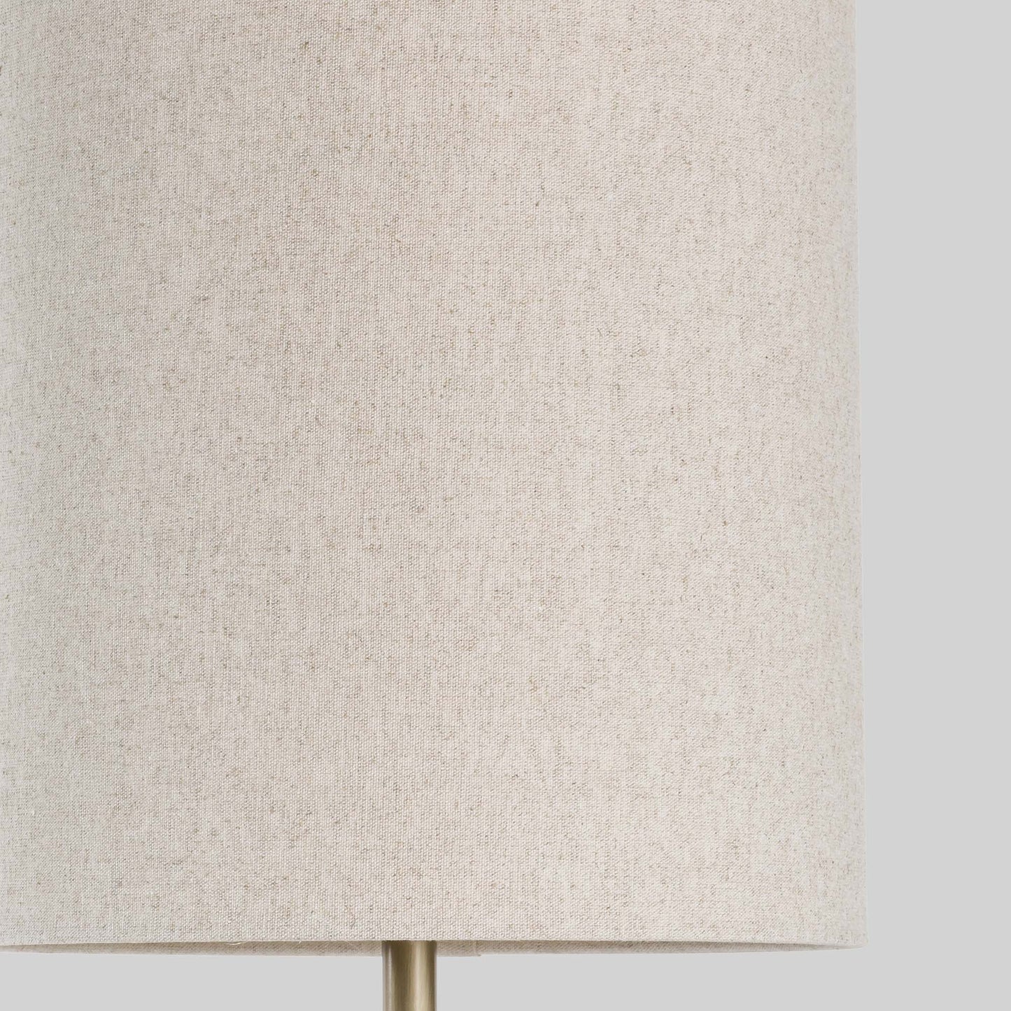 Floor lamp with a stacked circular wood base on a light gray background.