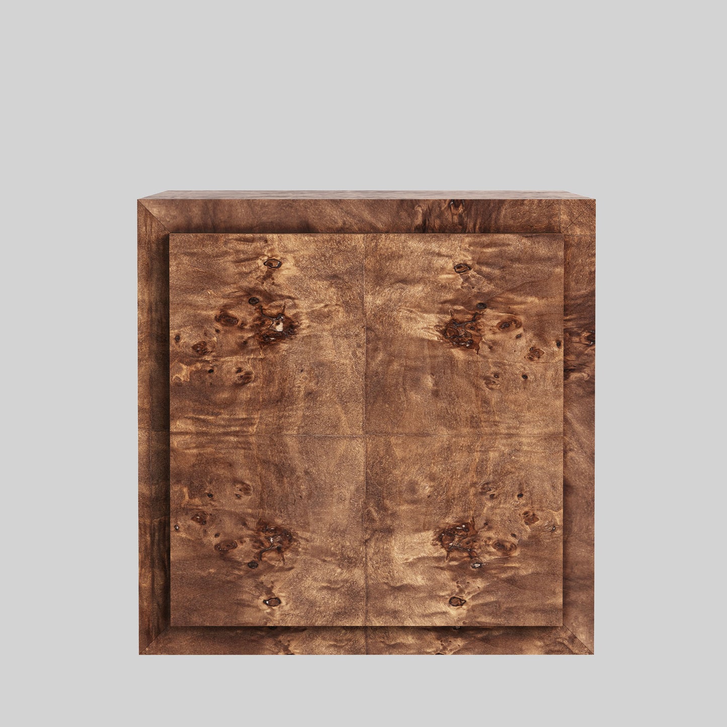 Dark burl wood plinth side table on gray background.