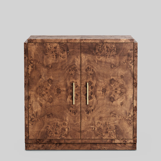 Dark burl wood sideboard on gray background.