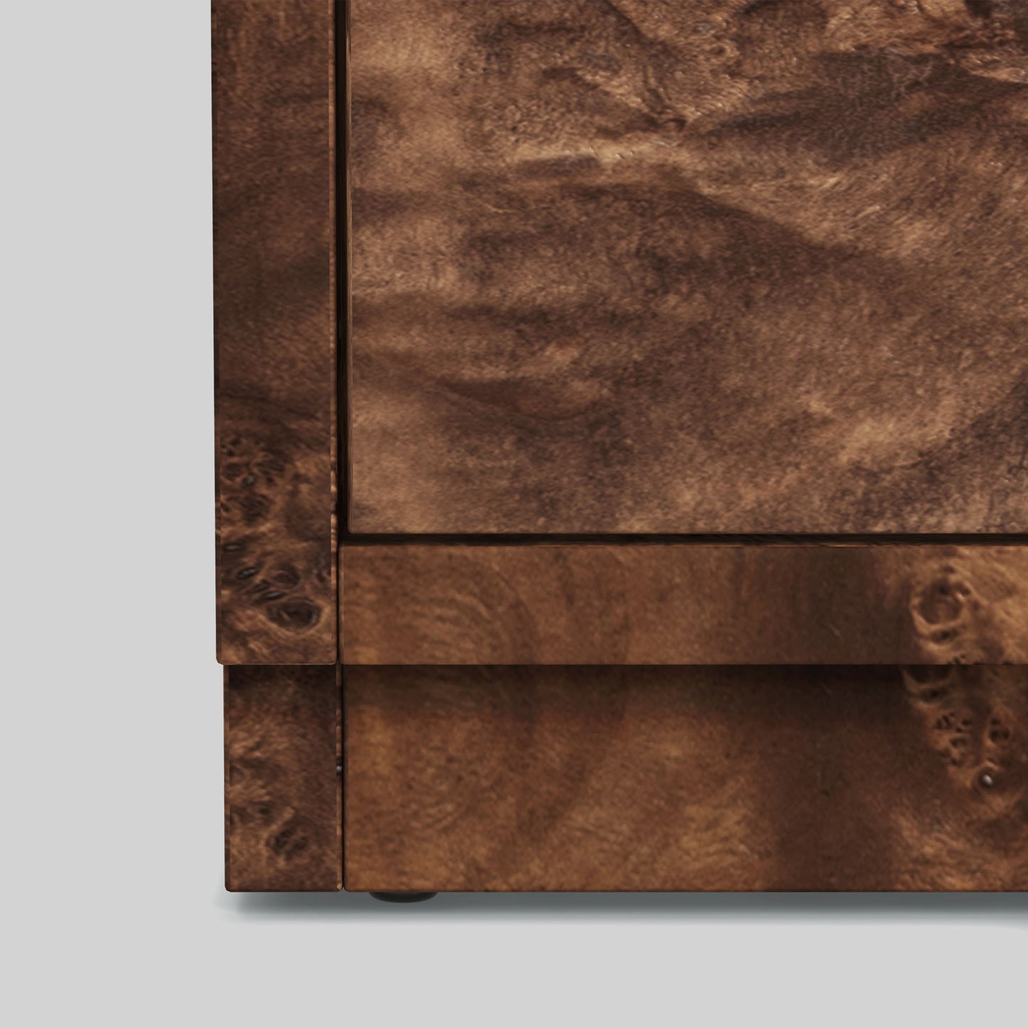 Dark burl wood sideboard on gray background.
