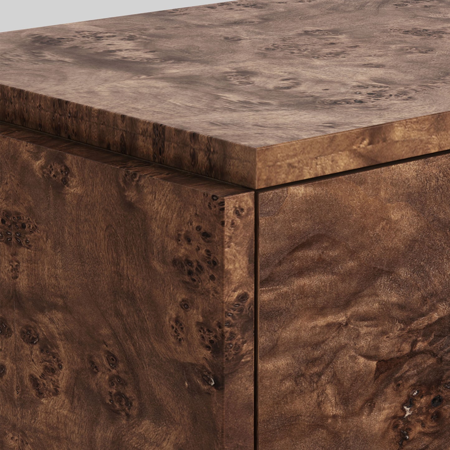 Dark burl wood sideboard on gray background.