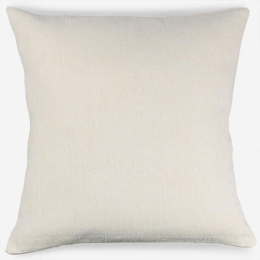 Handwoven Turkish kilim pillow cover in ivory white on light gray background.