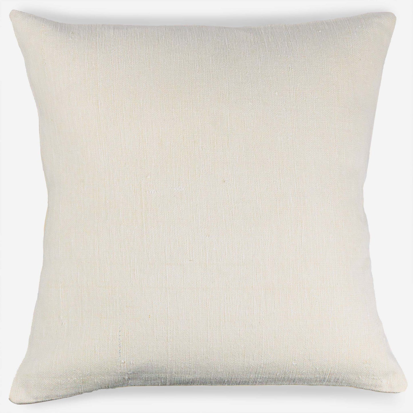 Handwoven Turkish kilim pillow cover in ivory white on light gray background.