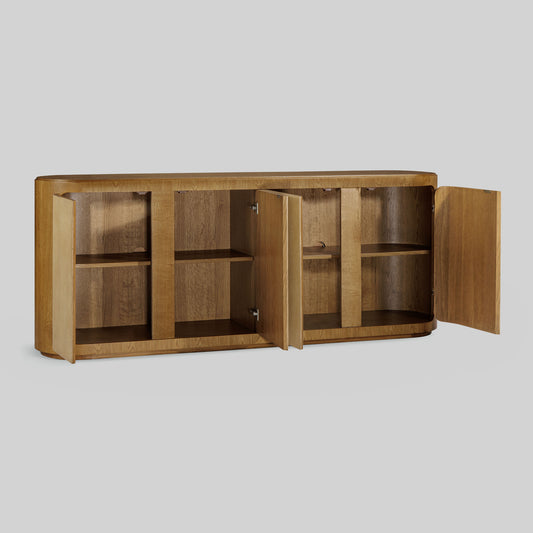 Natural oak sideboard with shagreen finished door panels on gray background.