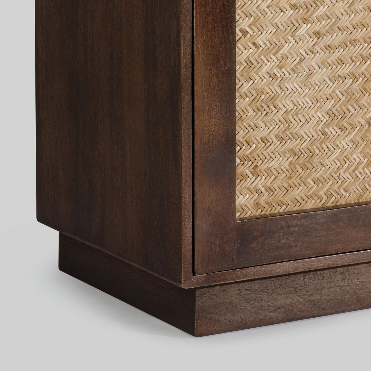 Wooden sideboard with four arched doors featuring a textured rattan design on a gray background.