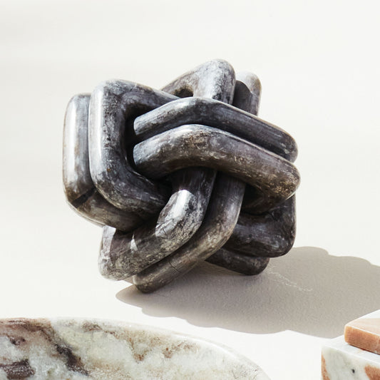 Marble knot sculpture - stylish home accent (Image1).