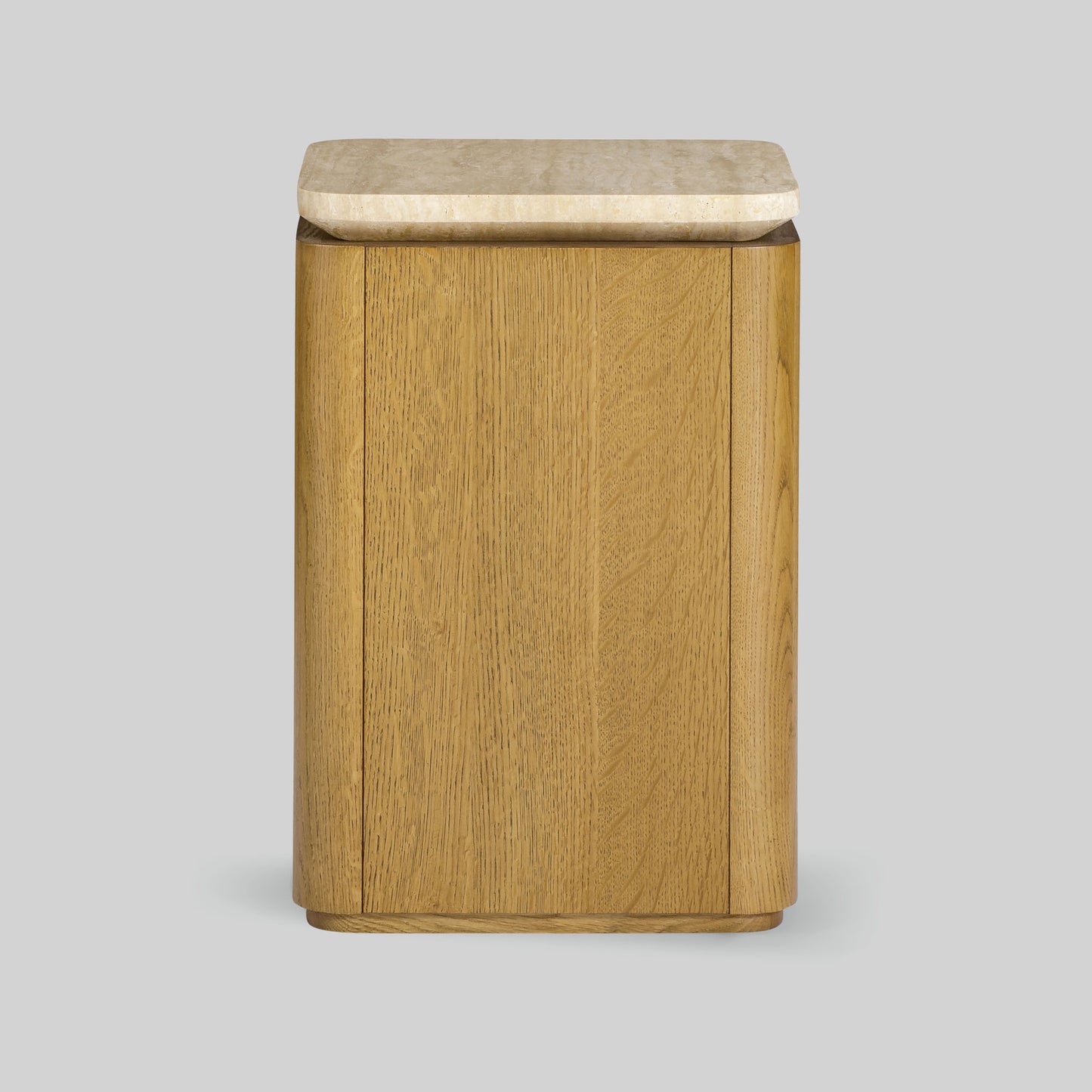 Wooden side table with a light finish and travertine top on a gray background.