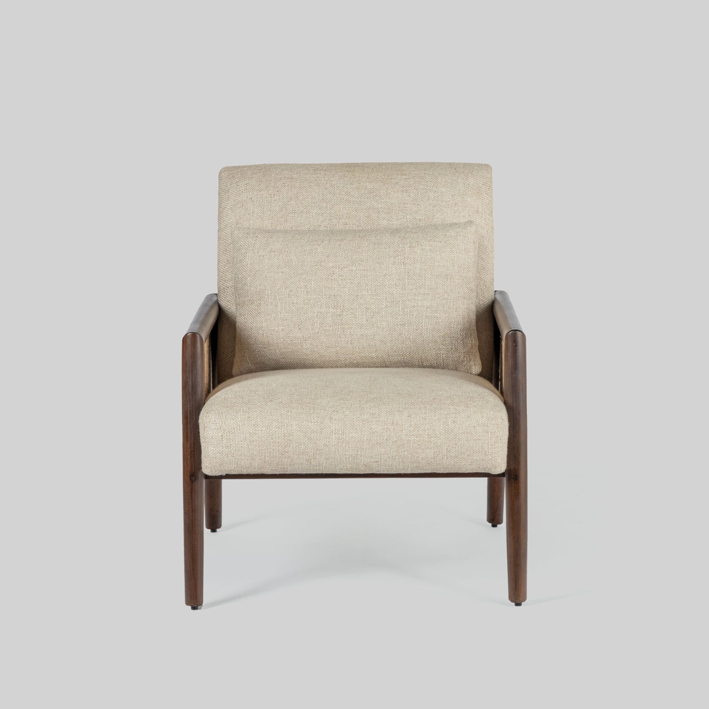 Beige armchair with cane arms and wooden frame on a light gray background.