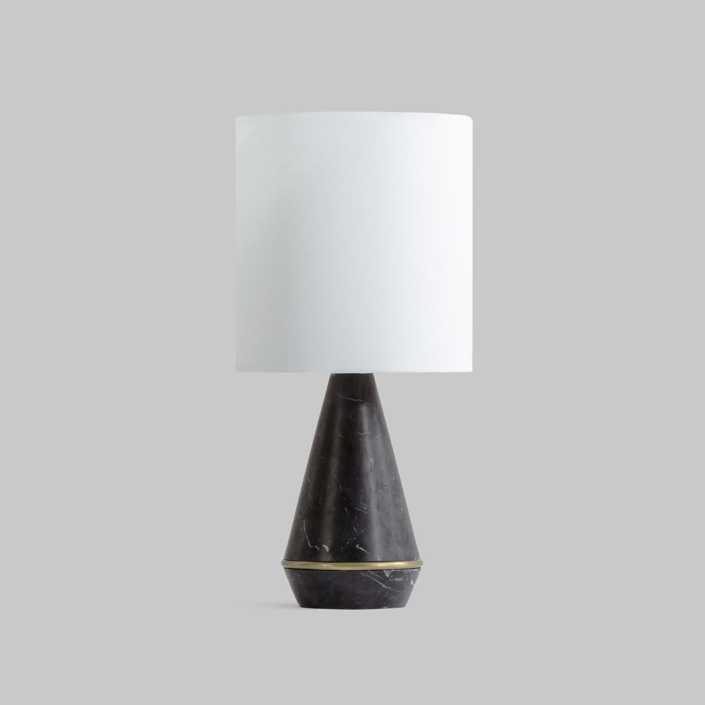 Modern honed black marble table lamp.