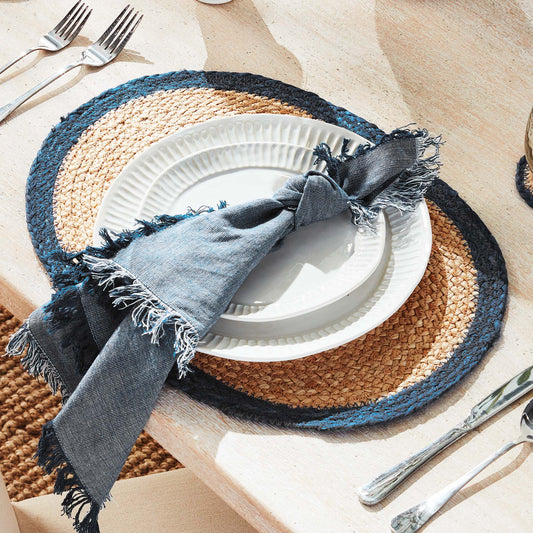 Oval jute placemats with navy border (set of 8) - stylish home accent (Image1).