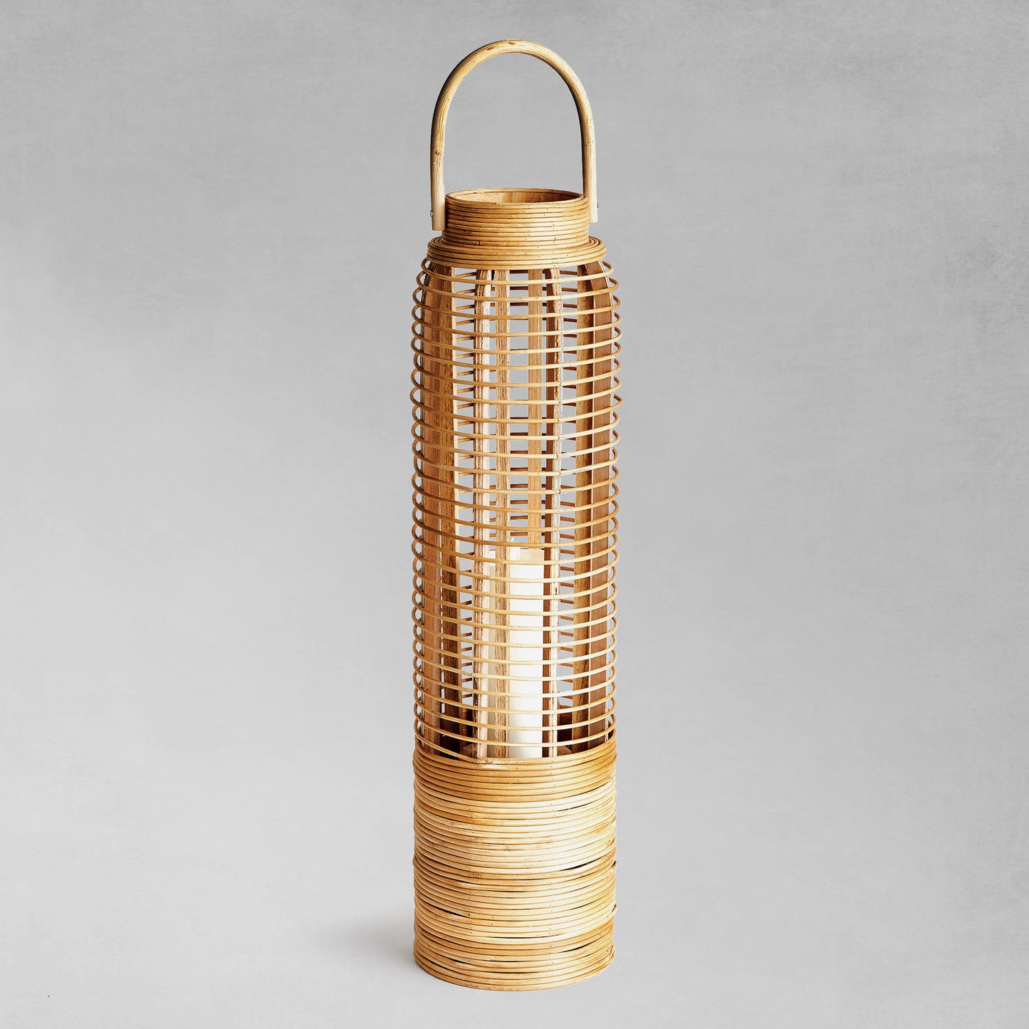 Rattan cylinder large lantern with gray background.