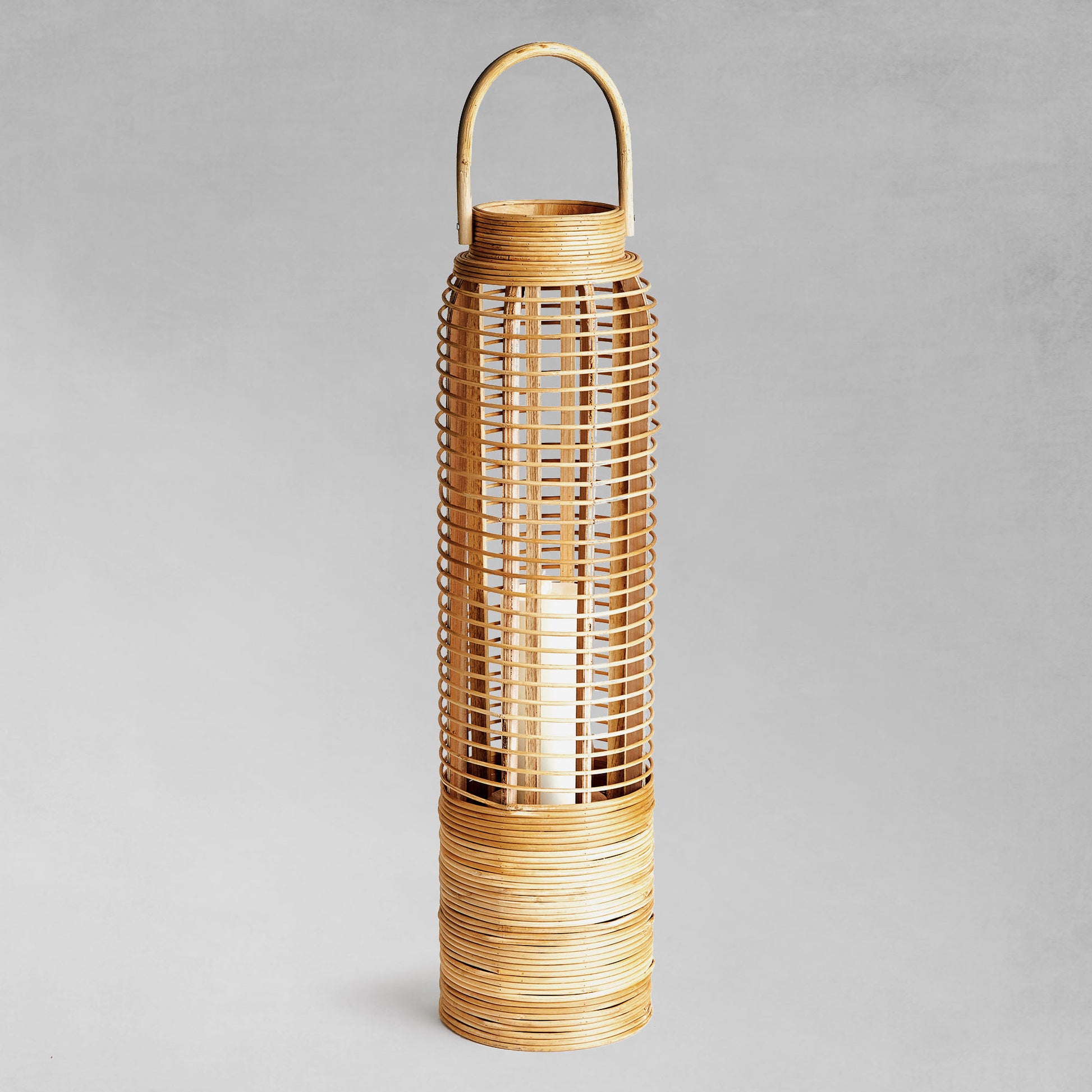 Rattan cylinder large lantern with gray background.