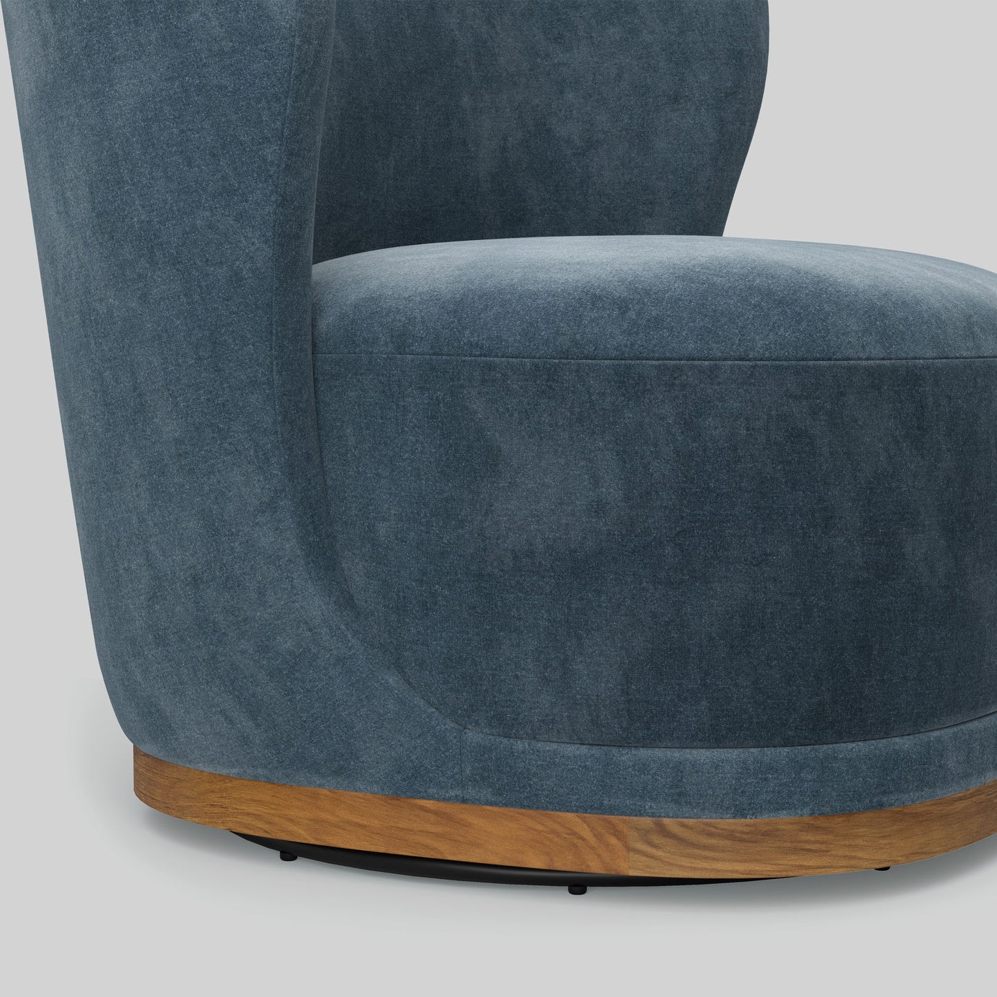 Blue swivel chair with wooden base on a light gray background.