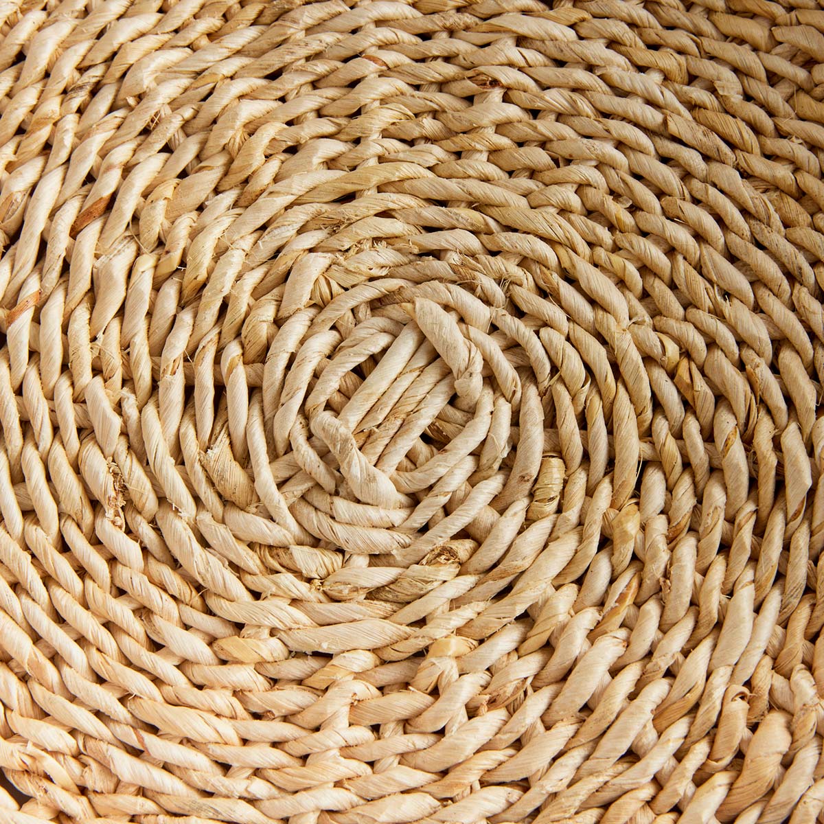 Round braided trays closeup of natural fibers.