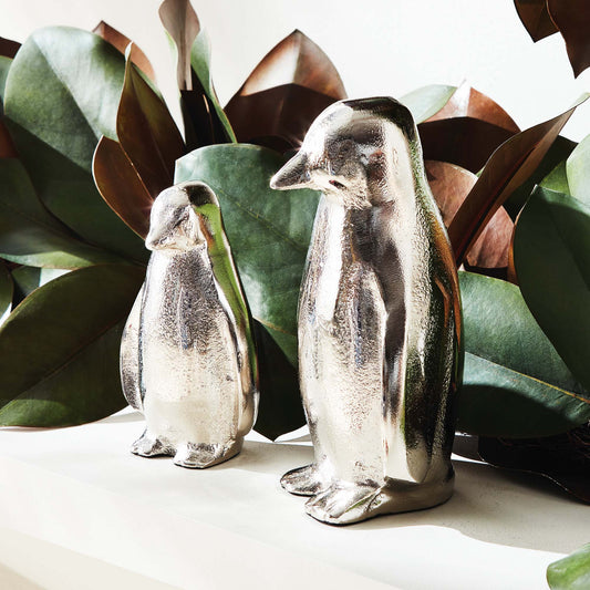 Silver aluminum penguin sculptures (set of 2) - stylish home accent (Image1).