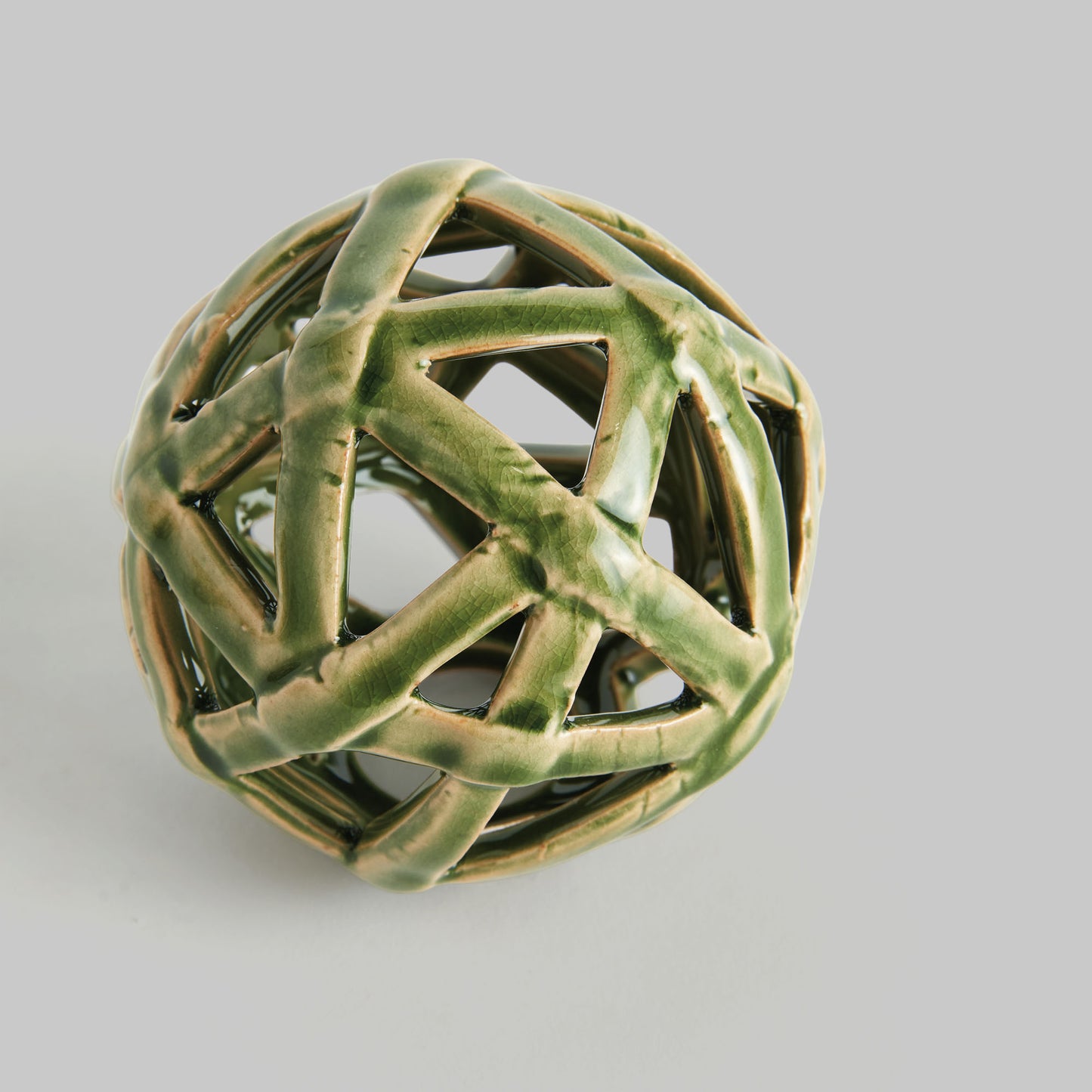 Small green reactive glaze ceramic orb - stylish home accent (Image3).
