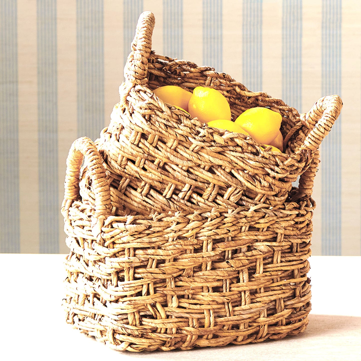Small woven banana leaf baskets with handles (set of 2) - stylish home accent (Image2).