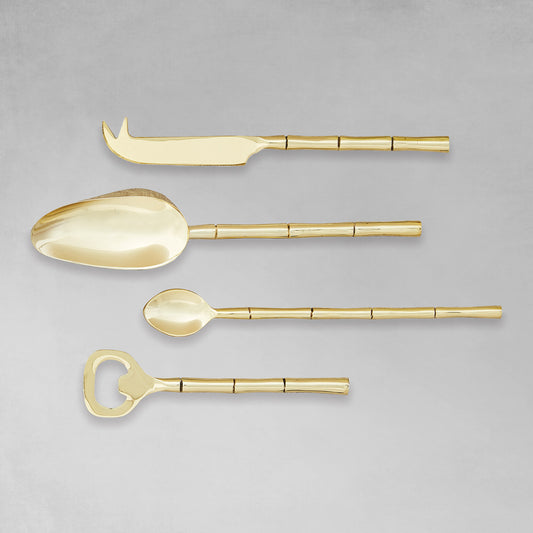 Stainless steel bamboo style barware tools set in gold with gray background.