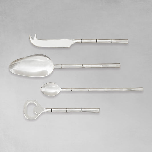 Stainless steel bamboo style barware tools set with gray background.