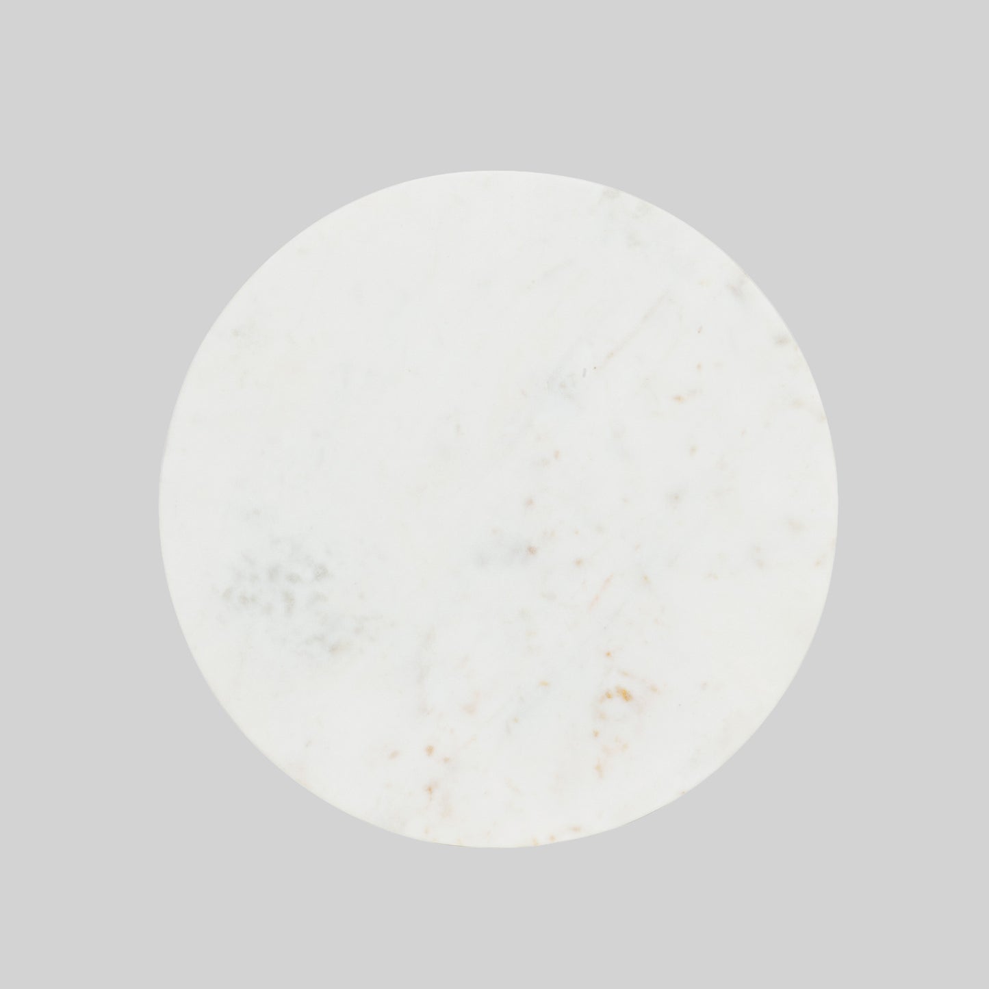 Top view of small round cocktail table with marble top and base on a gray background.