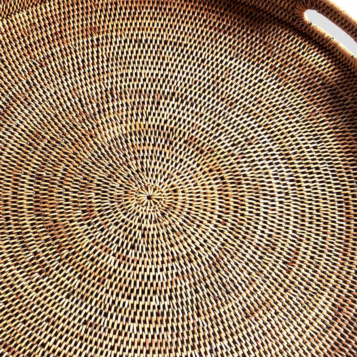 Woven ottoman tray in large size with dark finish, closeup view, and gray background.