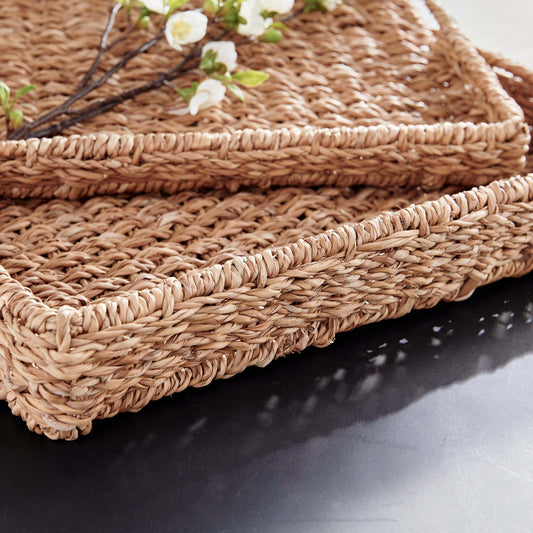 Woven seagrass rectangular tray set, side closeup view.