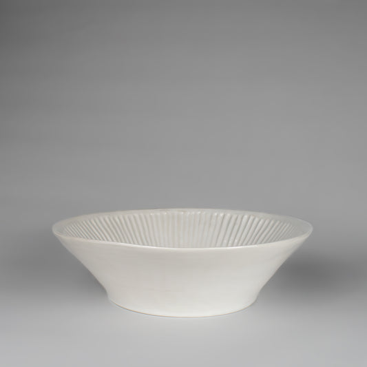 Artesa decorative ceramic bowl/vessel with light gray background.