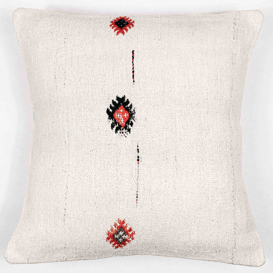 Handwoven Turkish kilim sisal pillow cover in cream with orange and blue motif design accents.