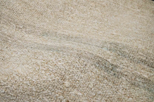 Handwoven Turkish kilim sisal pillow cover fabric in sand with light gray stripes.