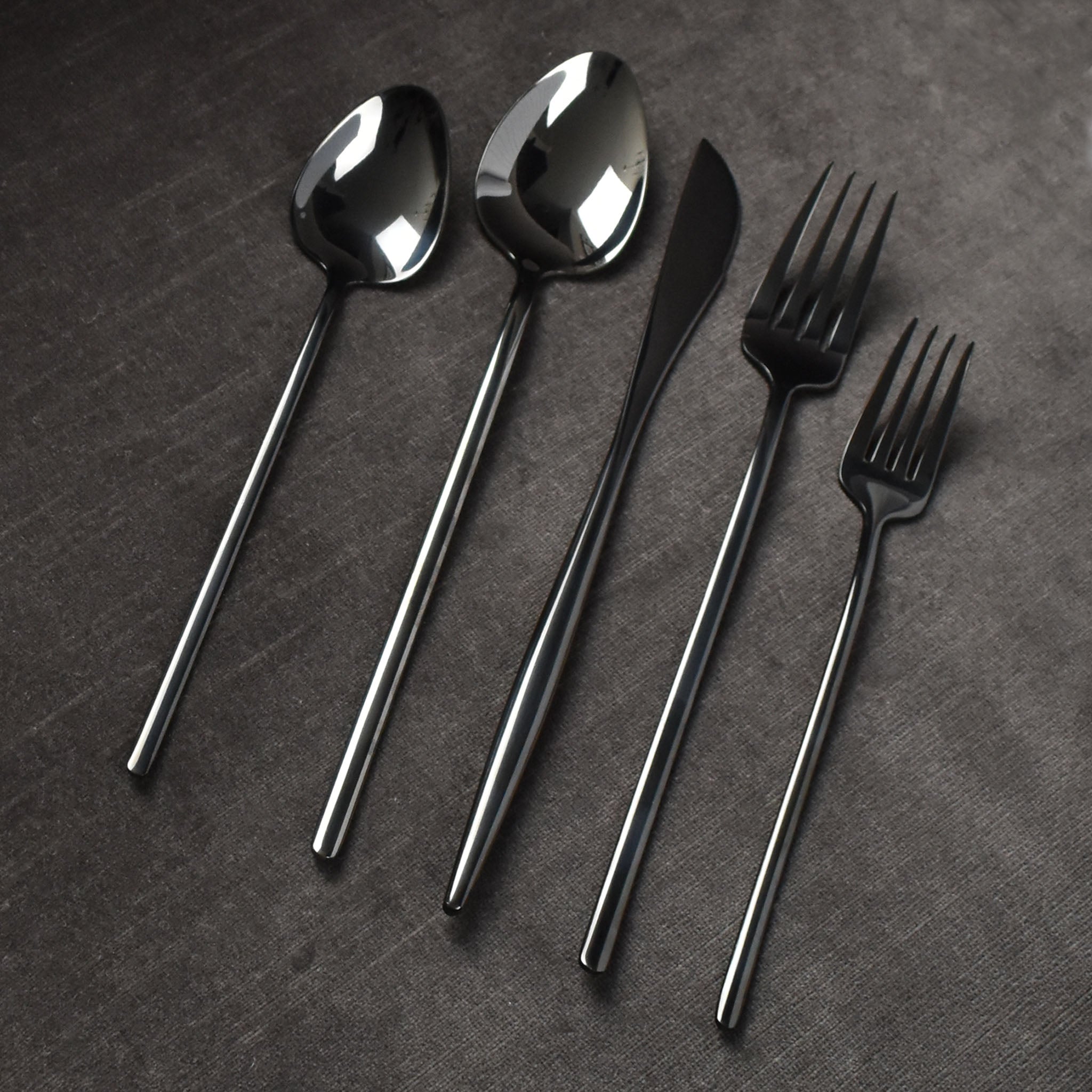 flatware set in brushed gold & black | parker + gibbs