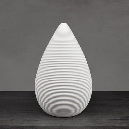 White ceramic ribbed conical vase.