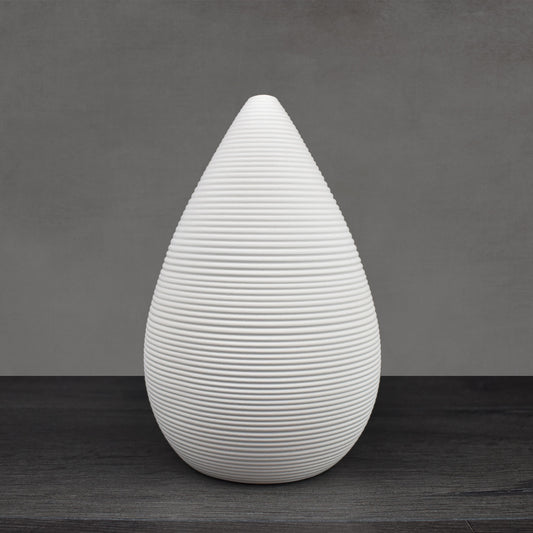 White ceramic ribbed conical vase.