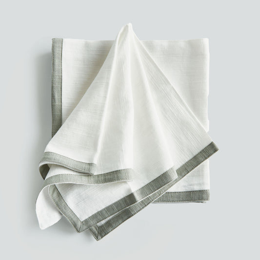 White with sage green border cotton dinner napkins (set of 4) - stylish home accent (Image1).