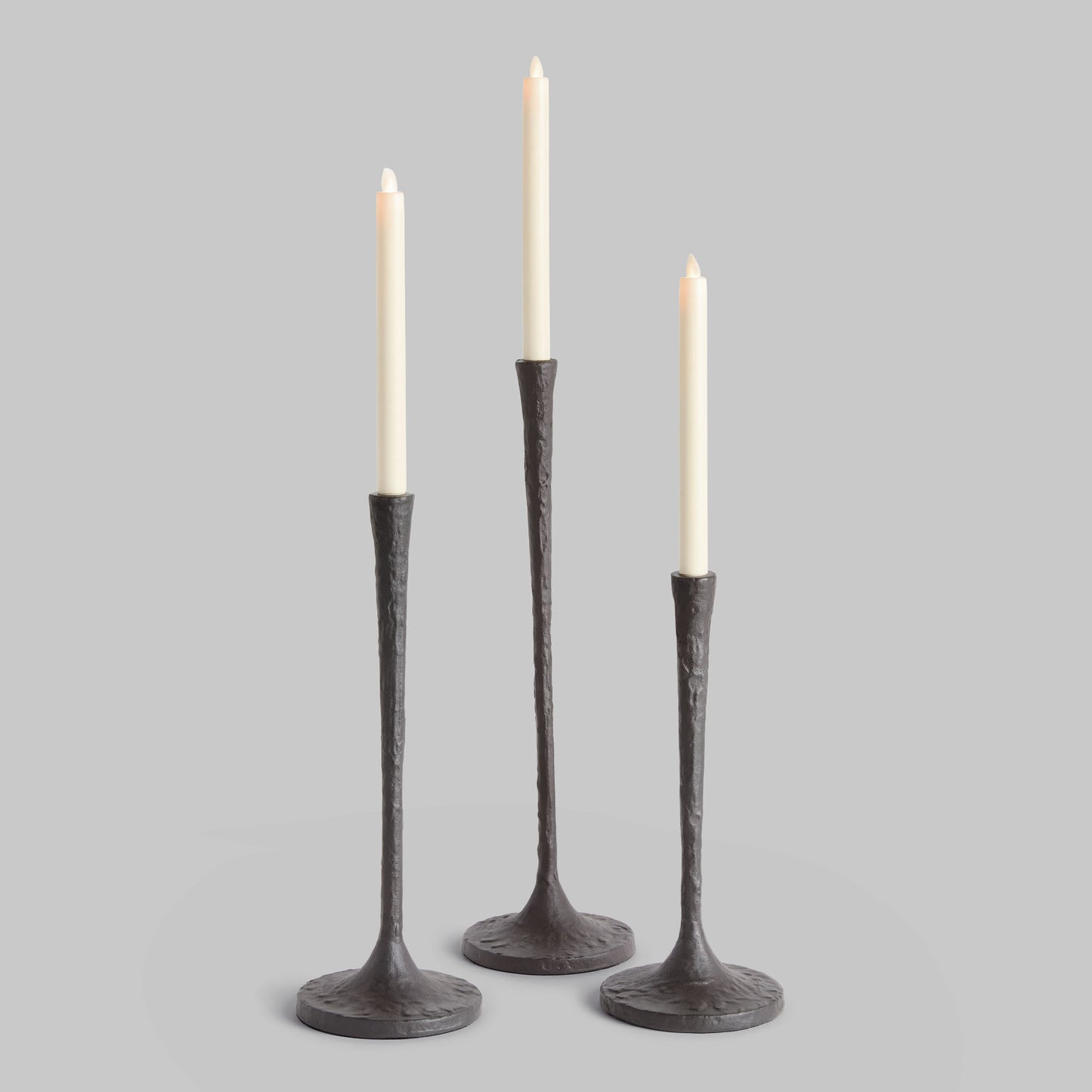 Black bronze taper candle holders (set of 3) - stylish home accent (Image1).