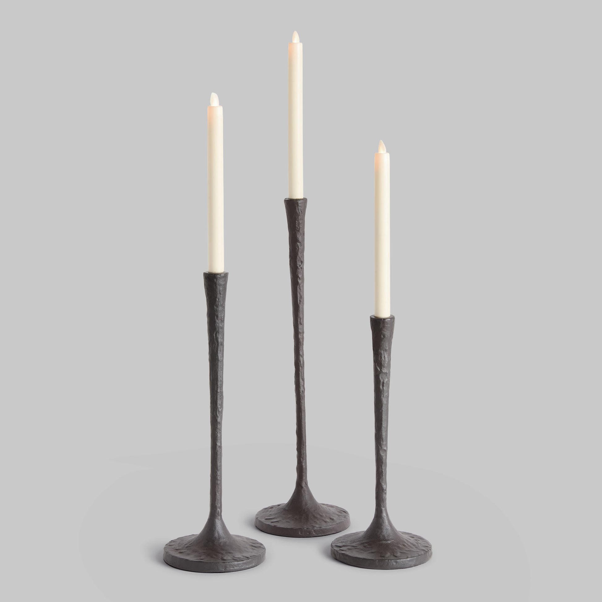 Black bronze taper candle holders (set of 3) - stylish home accent (Image1).