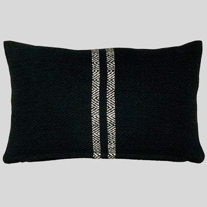 Black double striped lumbar pillow with gray background.