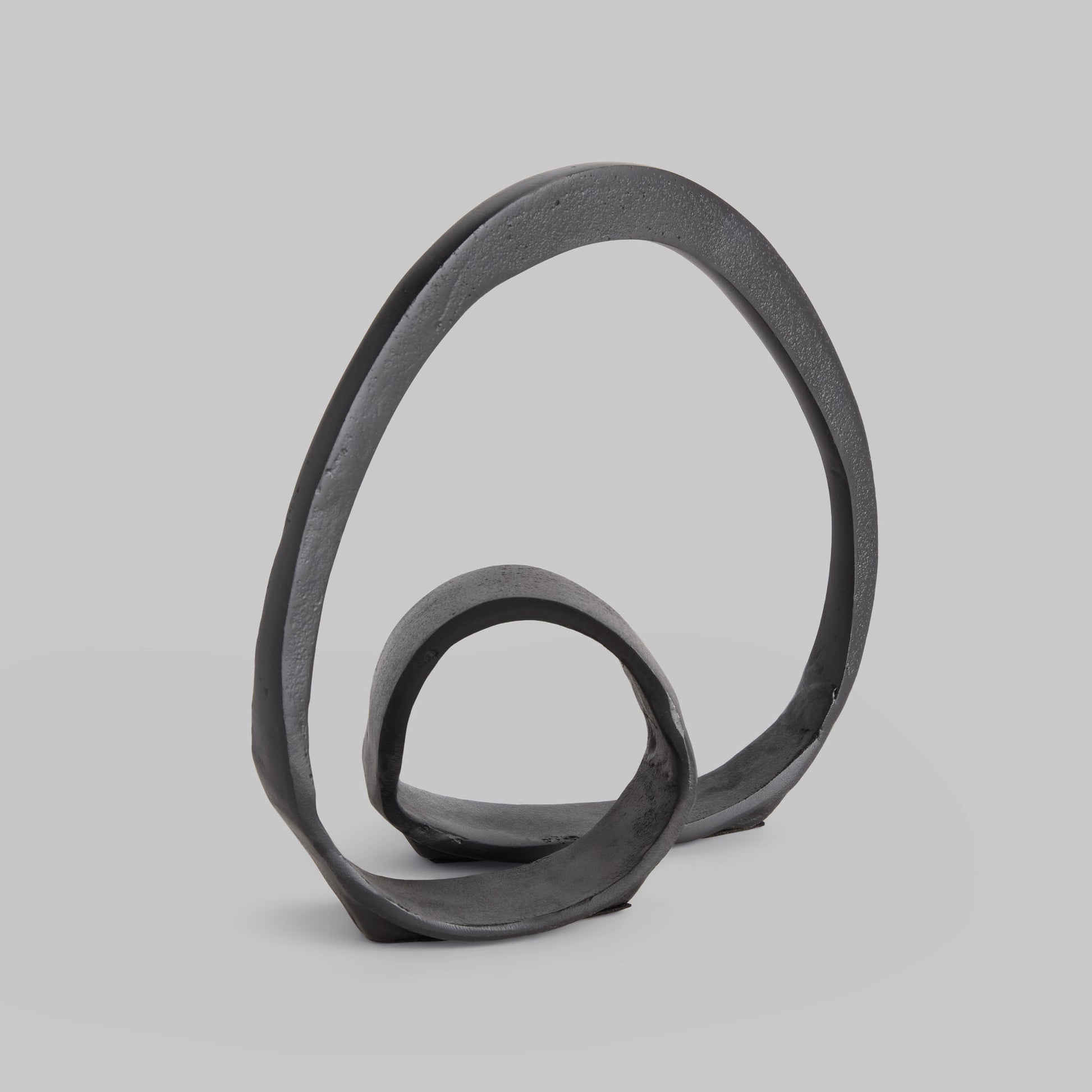 Black matte cast aluminum sculpture - stylish home accent (Image1).