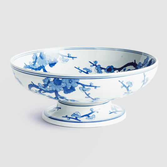 Blue and white ceramic footed bowl - stylish home accent (Image1).