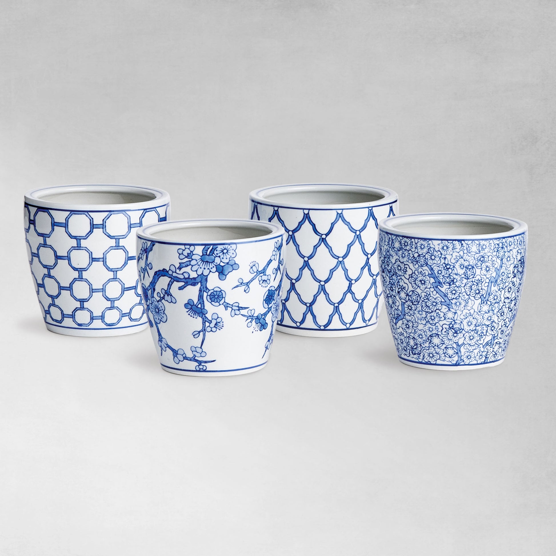 Blue and white hand-painted ceramic midi pots (set of 4) - stylish home accent (Image1).