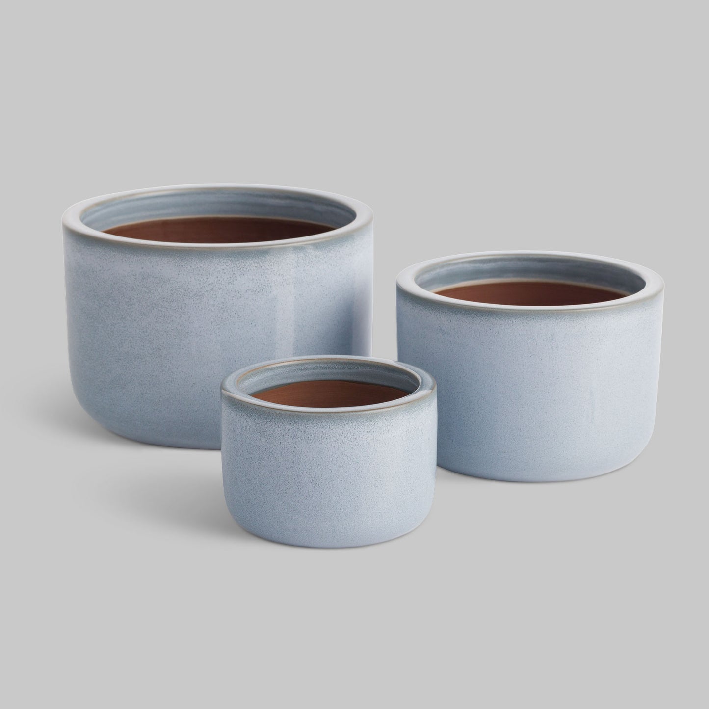 Blue reactive glaze ceramic pots (set of 3) - stylish home accent (Image1).