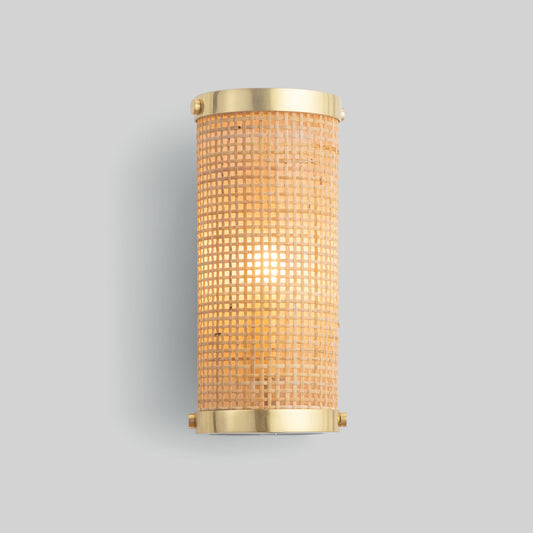 Wall-mounted light fixture with gold trim and textured glass on a gray background.