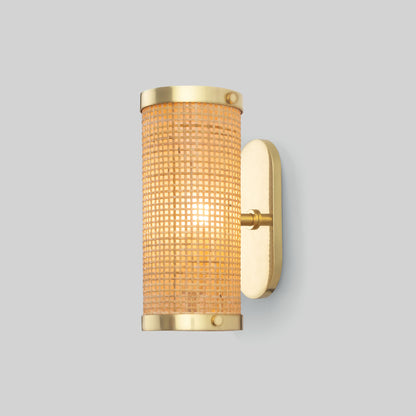 Wall-mounted light fixture with gold trim and textured glass on a gray background.