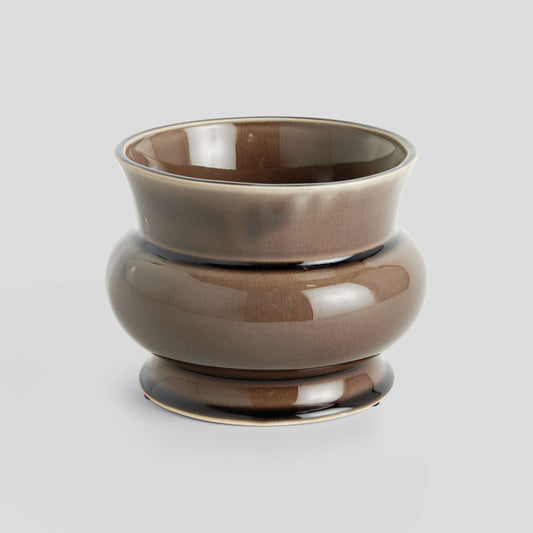 Brown reactive glaze ceramic pot - stylish home accent (Image1).