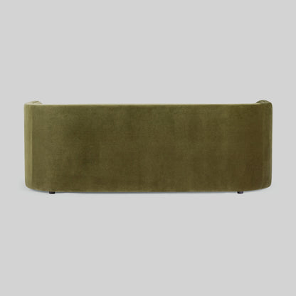 Green fabric sofa on a light gray background.