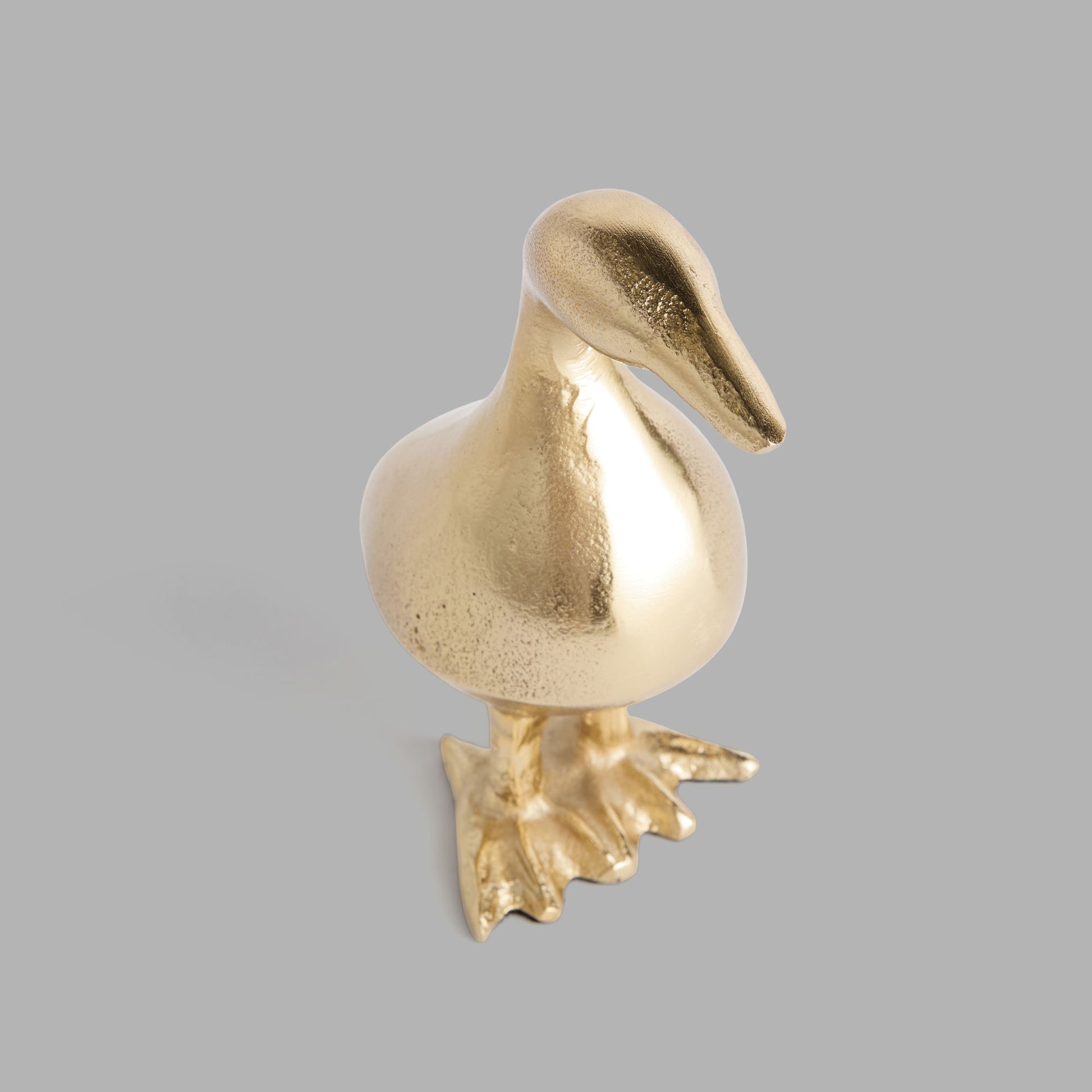 Champagne gold cast aluminum duck sculpture - stylish home accent (Image2).